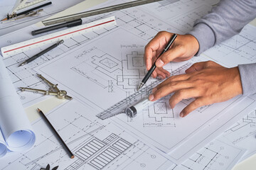 Architect engineer contractor design working drawing sketch plan blueprint and making architectural...