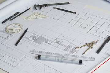 Architect engineer contractor design working drawing sketch plan blueprint and making architectural construction house building in architect studio.