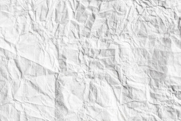 Crumpled white paper as an abstract background.