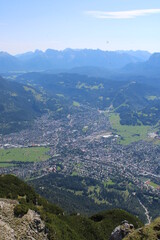 Fototapeta na wymiar Aerial image of the city of Garmisch-Partenkirchen taken on Kramer Mountain in COVID-19 summer 2020