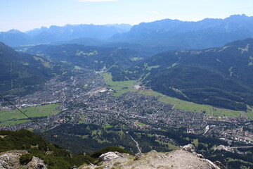 Aerial image of the city of Garmisch-Partenkirchen taken on Kramer Mountain in COVID-19 summer 2020