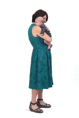 side view of  full portrait of a mother with her baby on white background