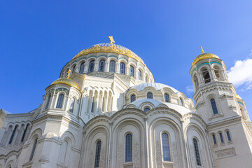 Kronshtadt, Saint Petersburg, Russia,09.08.2020. The Cathedral of St. Nicholas the Wonderworker. Blue sky, clouds and sunny weather. important religious site.