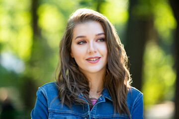 Fashion Portrait of Stylish Pretty Brunette Young Woman Outdoor