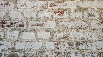 mur blanc usé en brique