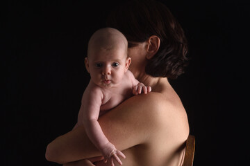 mother holding her baby