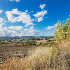 Countryside landscape, hills and blue sky
