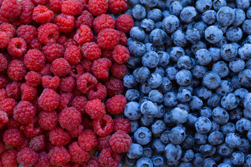 background of raspberries and blueberries