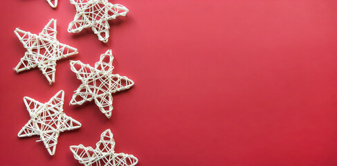 Christmas decorations on a red background. Copyspace. Flatlay