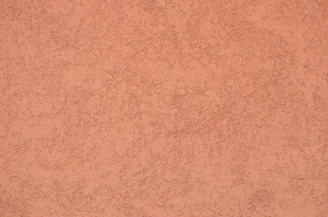 Decorative stucco wall of the house.