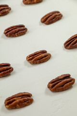 peeled pecan kernels lying on the table lines