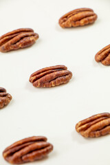 peeled pecan kernels lying on the table lines