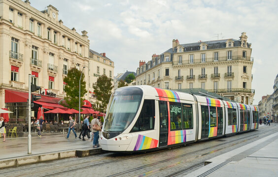 ANGERS, FRANCE - SEPTEMBER 26, 2013: City tram with a rainbow flag emblem of LGBT in Anges, France.