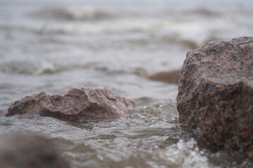 Stones washed by waves on the shore.