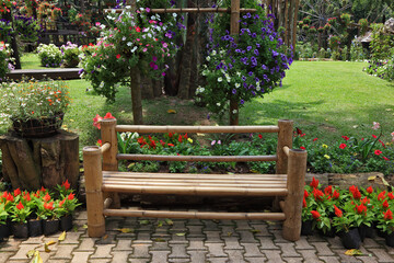 Naklejka premium A flowers and a bench