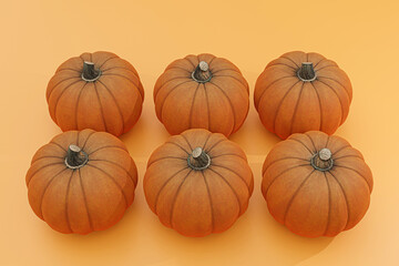 pumpkins isolated on orange background