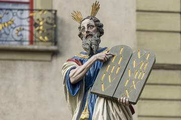 The Mosesbrunnen, Moses fountain in old town. The figure of Moses holding Ten Commandments in Bern,...