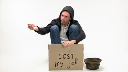 Man lost his job and begging for money. Isolated on white background. Job loss due to COVID-19 virus pandemic concept.