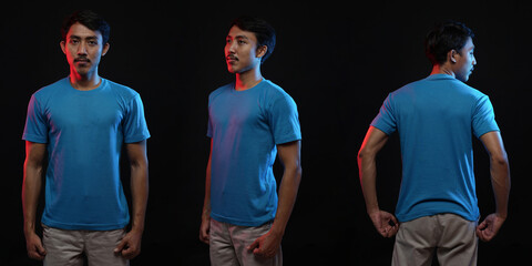 Obraz premium Young male in blank blue T-shirt, front and back view, isolated black background. Design men tshirt template and mockup for print