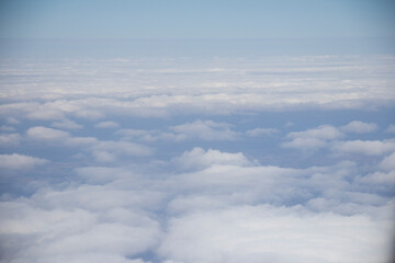 Fototapeta na wymiar beautiful background flying above the clouds