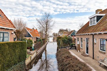 Residential buildings and canal in Hindeloopen, Netherlands, Europe