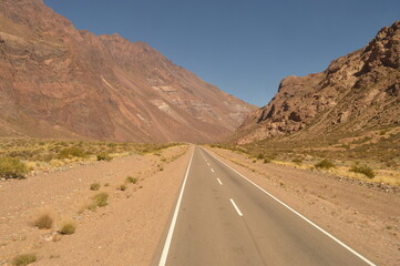 Driving and hiking in the Andes Mountains between Chile and Argentina on the way to Mendoza