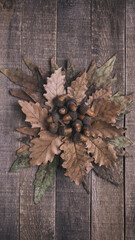 autumn leave. on wood background. christmas background. october. november