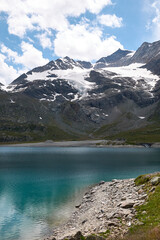 Naklejka na ściany i meble View of Lago Bianco and Lago Nero from Bernina pass