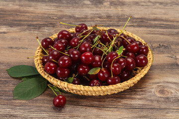 Sweet ripe cherry with leaves