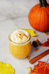 Homemade Pumpkin spice Smoothie /Latte on fall autumn background, selective focus