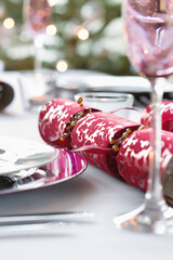 Closeup of Christmas cracker on dining table