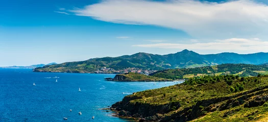 Foto op Plexiglas Steep coast of Roussillon, and in the background the village of Banyuls sur mer, in French Catalonia in Occitanie, France © FredP