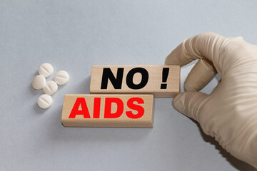 World Aids Day concept.Red ribbon as symbol of aids awareness on white background with copy space for text. 1 december World Aids Day concept.