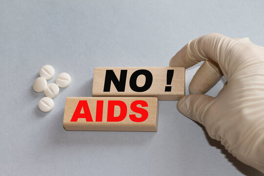 World Aids Day concept.Red ribbon as symbol of aids awareness on white background with copy space for text. 1 december World Aids Day concept.