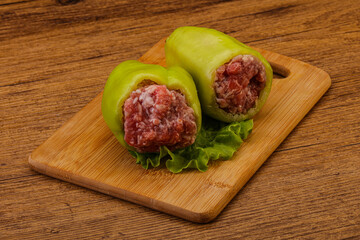 Raw stuffed bell pepper with meat