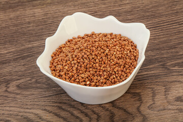 Raw buсkwheat cereal in the bowl