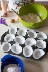 Young child baking mixing 