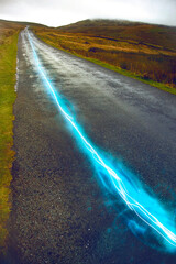 Fiber optic cable running above ground in the British Countryside