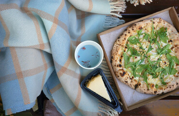 Picnic with Neapolitan pizza and blue tea