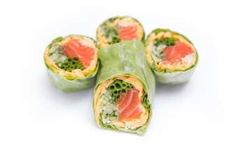 Rolls with red fish rice and vegetables wrapped in lettuce
