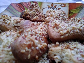 delicious crumbly cookies lying on a plate macro photography