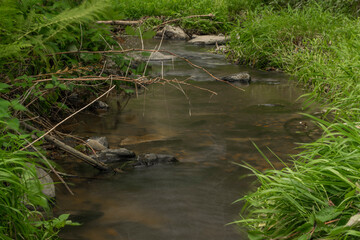 Zborovsky creek flowing to influence with Malse river in autumn day