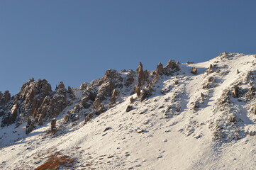 Hiking in the snowy mountains around San Carlos de Bariloche and San Martin de los Andes in...