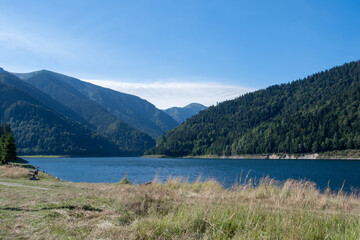 Gura apelor mountain lake and hills in Romania landscape