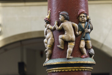 round character on the colorful pillar of the Pfeiferbrunnen fountain in Bern, Switzerland