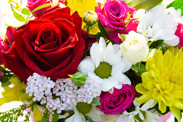 background of a bouquet of different flowers, different colors, the concept of birthday, wedding,...