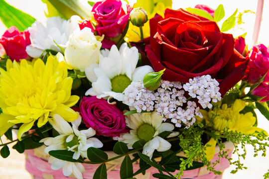 background of a bouquet of different flowers, different colors, the concept of birthday, wedding, date.