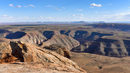 Fototapeta na wymiar Panoramic view from Muley Point Overlook, a remote cliff and scenic overlook of the desert landscape of southern Utah (Valley of the Gods), USA.