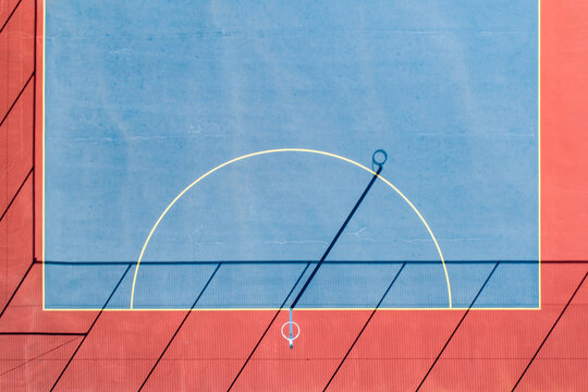 Looking down on netball goal and court.