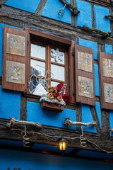 Christmas decorations in the Christmas Market, Riquewihr⁩, Alsace, France